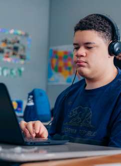 autistic student on the computer